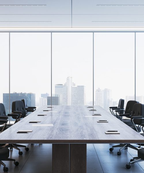 Spacious corporate boardroom with sleek black chairs, a long wooden desk, and floor-to-ceiling windows offering a city view. Contemporary design. 3D Rendering.